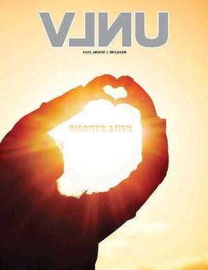 Magazine cover with image of woman making heart hands. Headline reads &quot;UNLV Strong&quot;